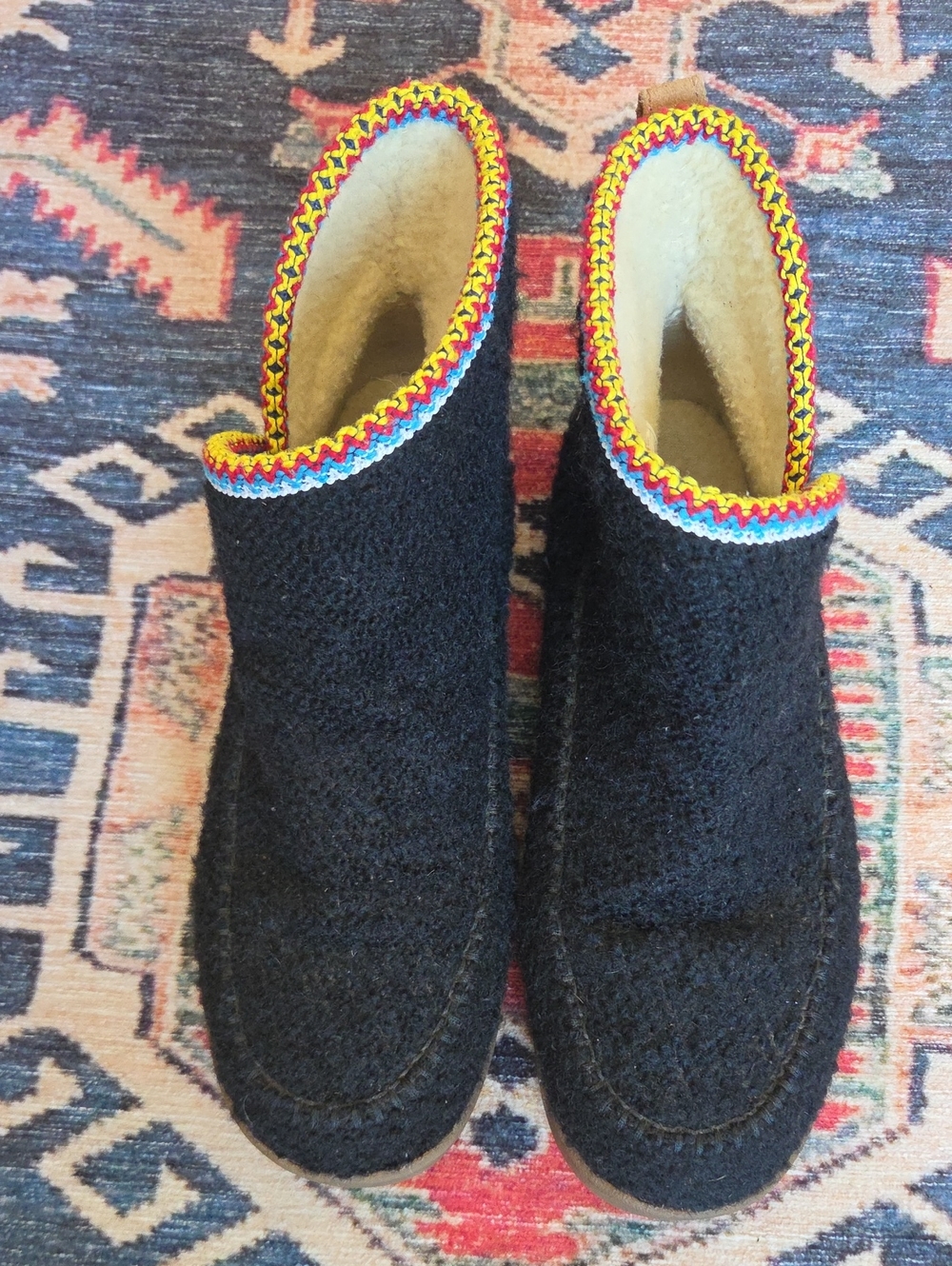 Sanuk Black Wool Slip-On Boots with Vibrant Trim